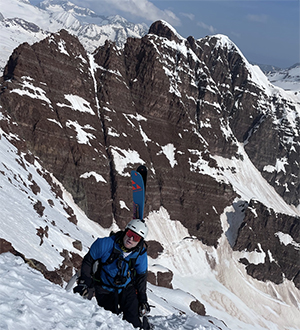 CU medical student Michael Nocek in snow on mountain