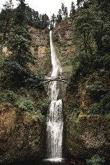 Picture of a bridge above a waterfall