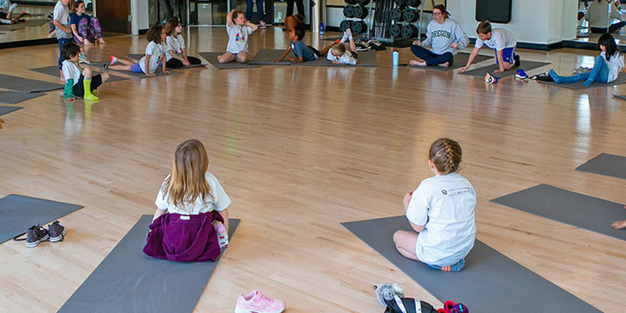 Children sitting at summer camp