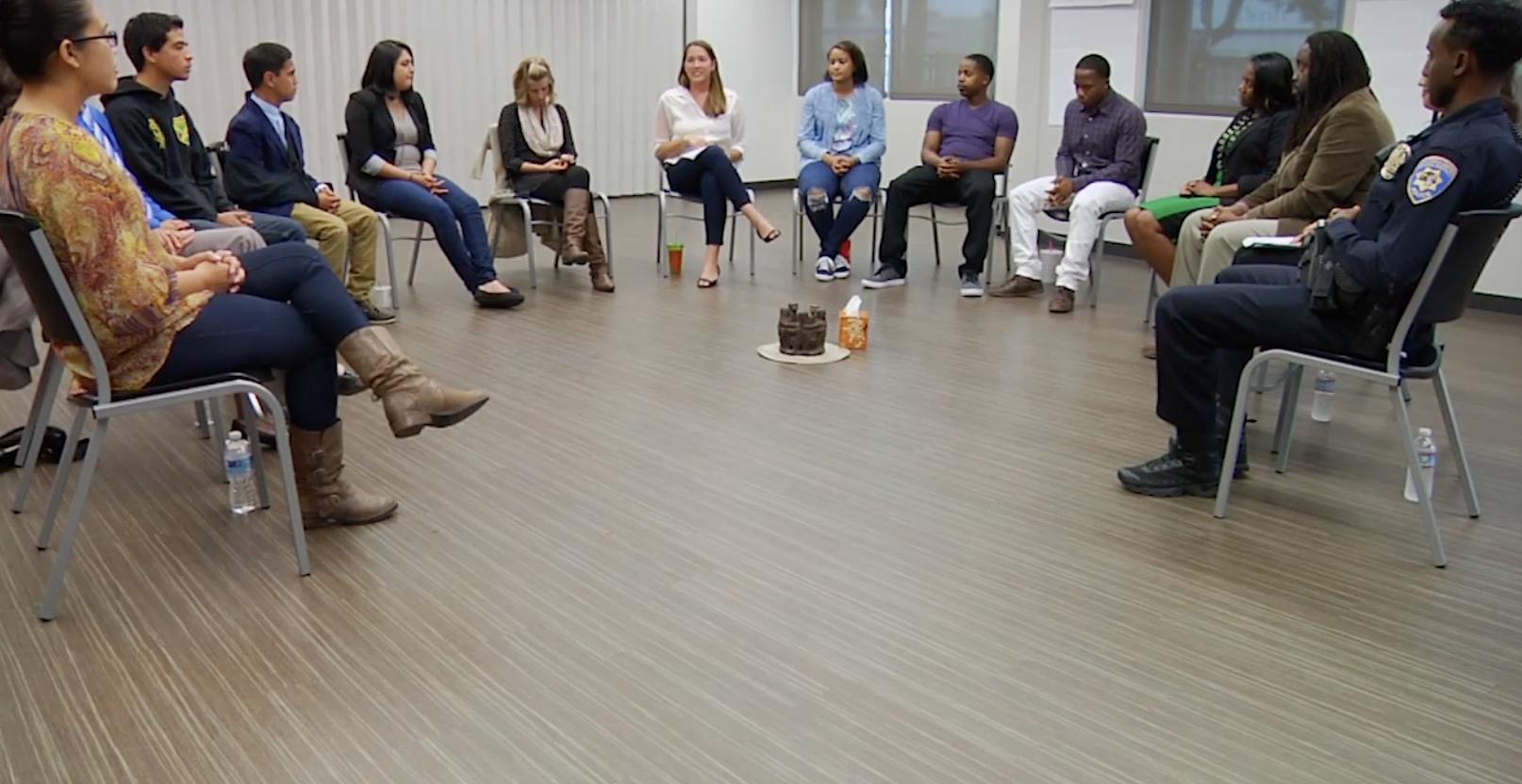 People sitting in a circle.