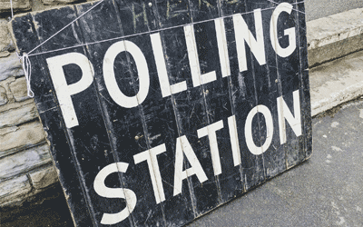 Image of a sign reading "polling station".
