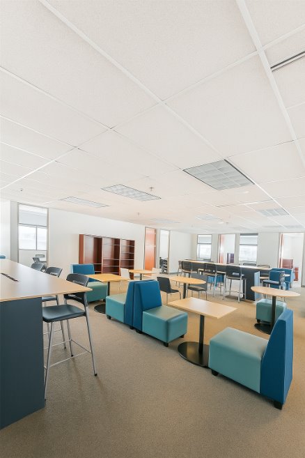 room filled with tables and chairs