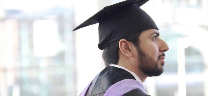 Fahad Alhammadi in graduation cap and gown