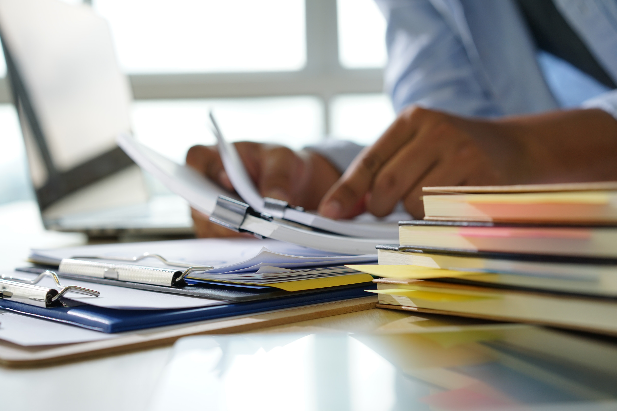 Male hands with office papers