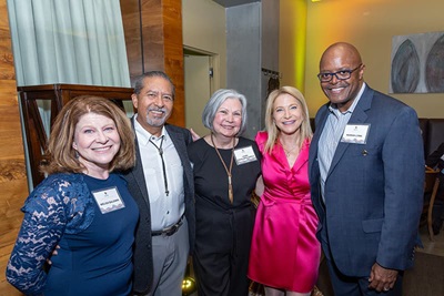 Group of CU Denver supporters smile for a photo during the 2023 Donor Celebration reception.