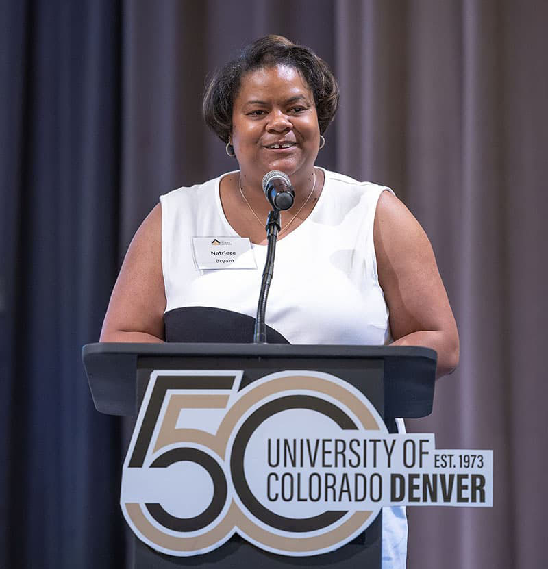 Natriece speaking at a Stanchion.