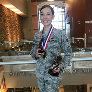 Staff Sgt. Manuella Tabares in uniform with awards