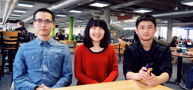 Students Li Miao, Siyu Zou, and Tong Liu