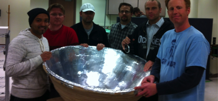 students holding Sterling Dish generator