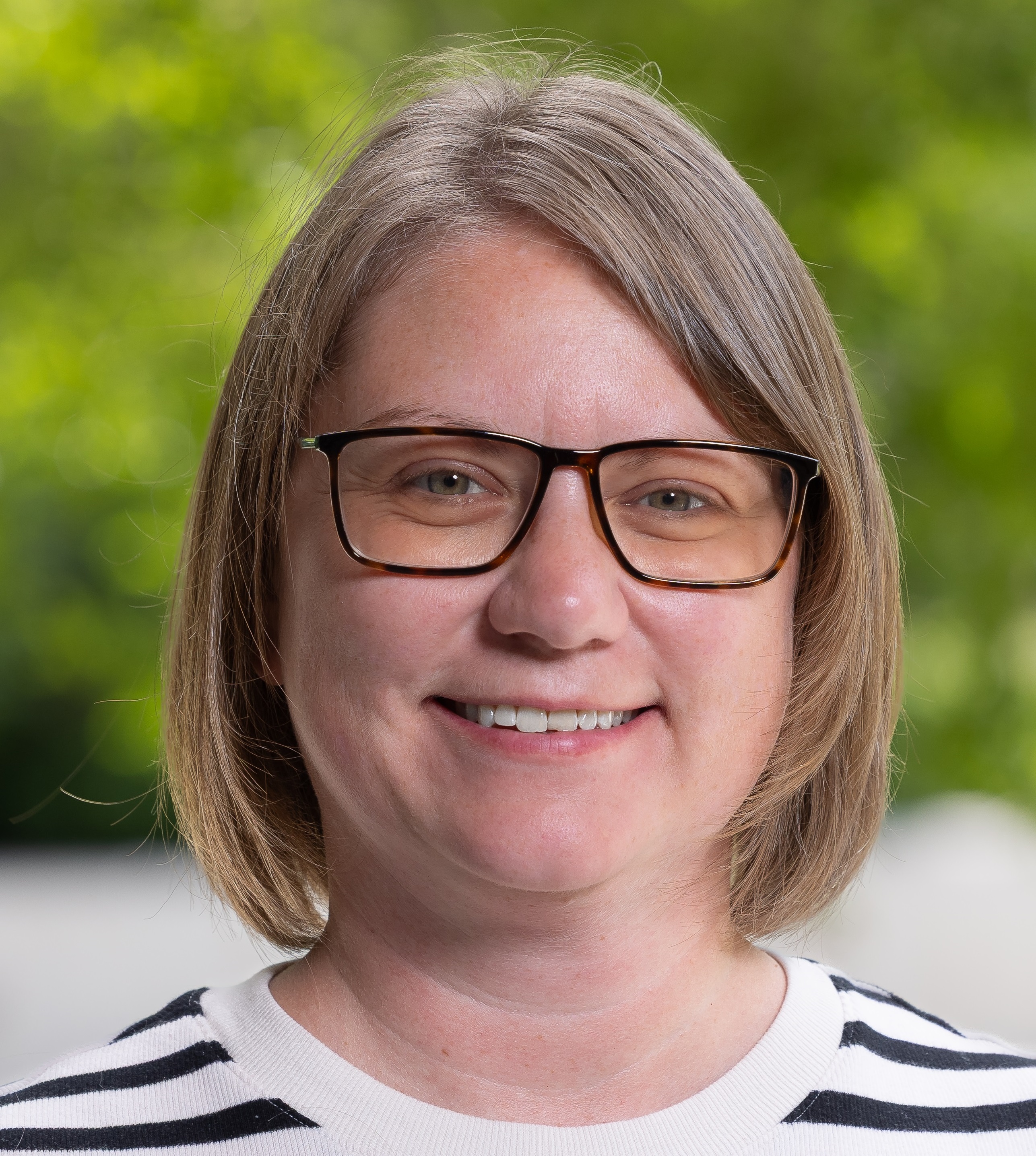 Girl in black and white striped shirt