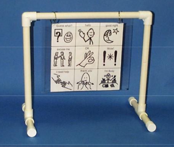 simple stand made of pvc tubes with a communication grid hanging from the top