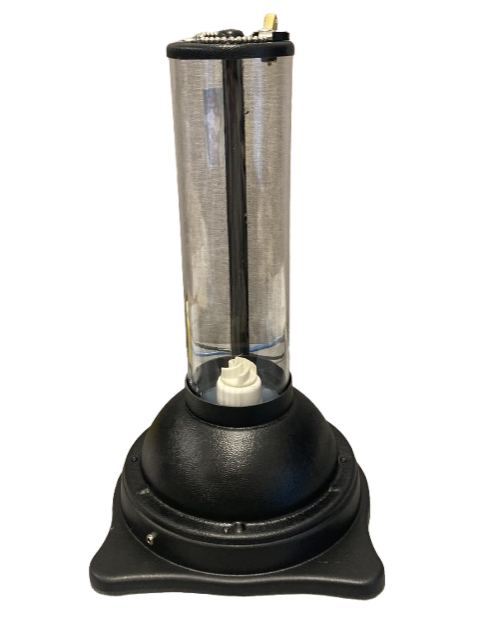 large tube standing vertically on a larger base