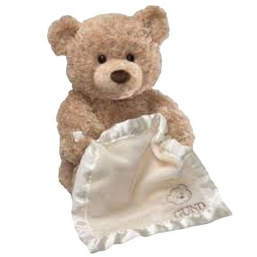 stuffed teddy bear with a little silk blanket