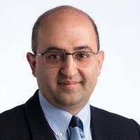 Close-up headshot of Farnoush Banaei-Kashani in business suit