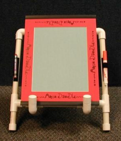 easel made of pvc tubes holding a notepad