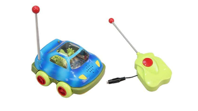 a plastic car with a long antannae and and a switch-adapted remote with a similar antannae
