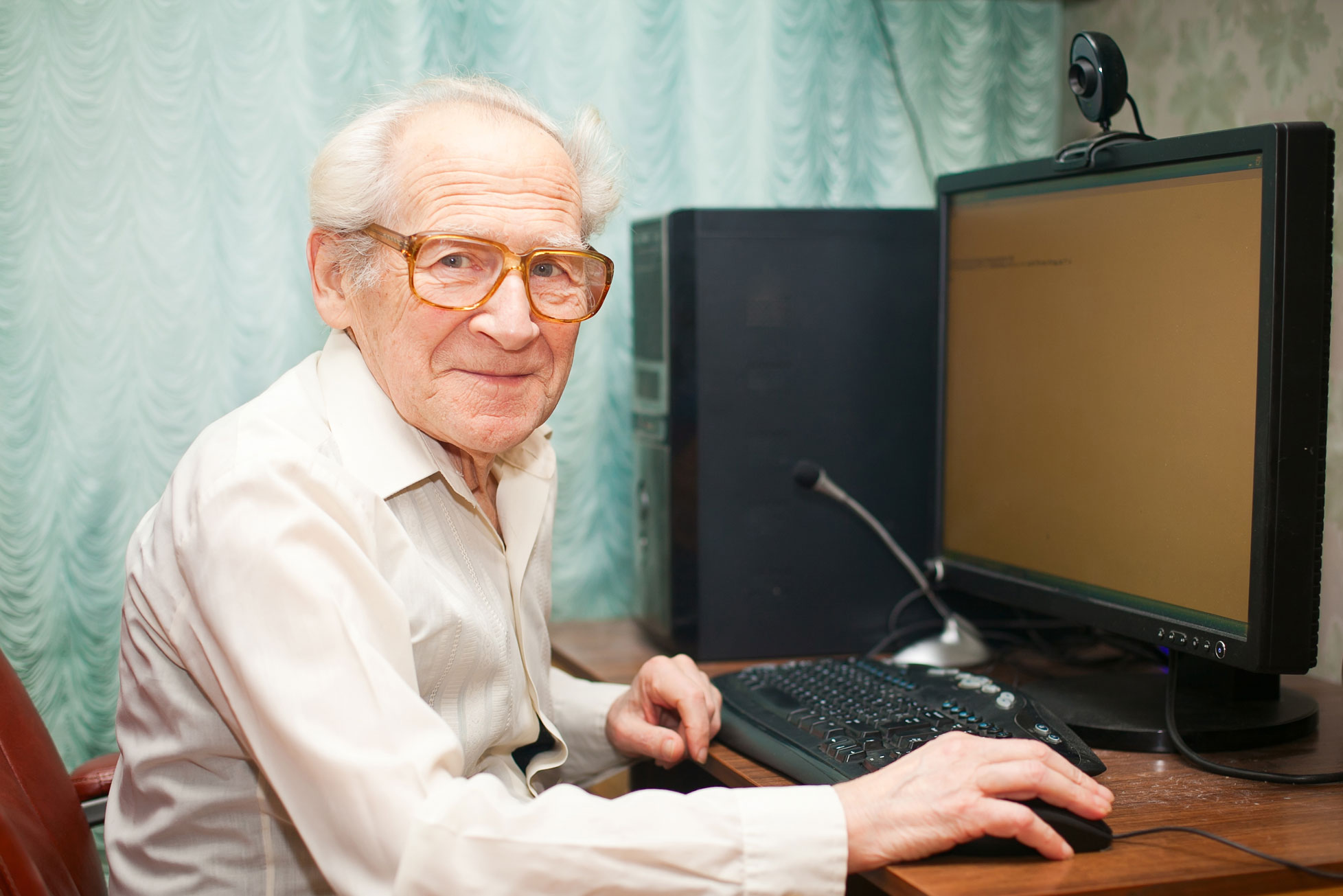 Older man at a computer