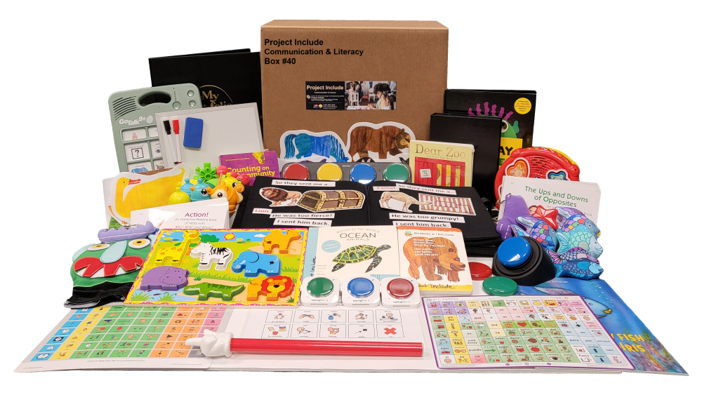 Communication and Literacy Kit unpacked with more than 20 colorful toys and tools including core boards, literacy manipulatives, adaptive books, and communication buttons