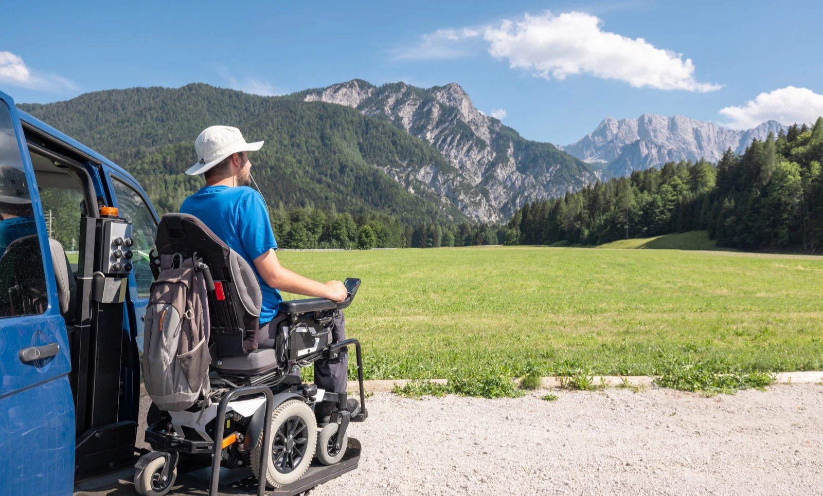 Man in wheelchair in the mountains