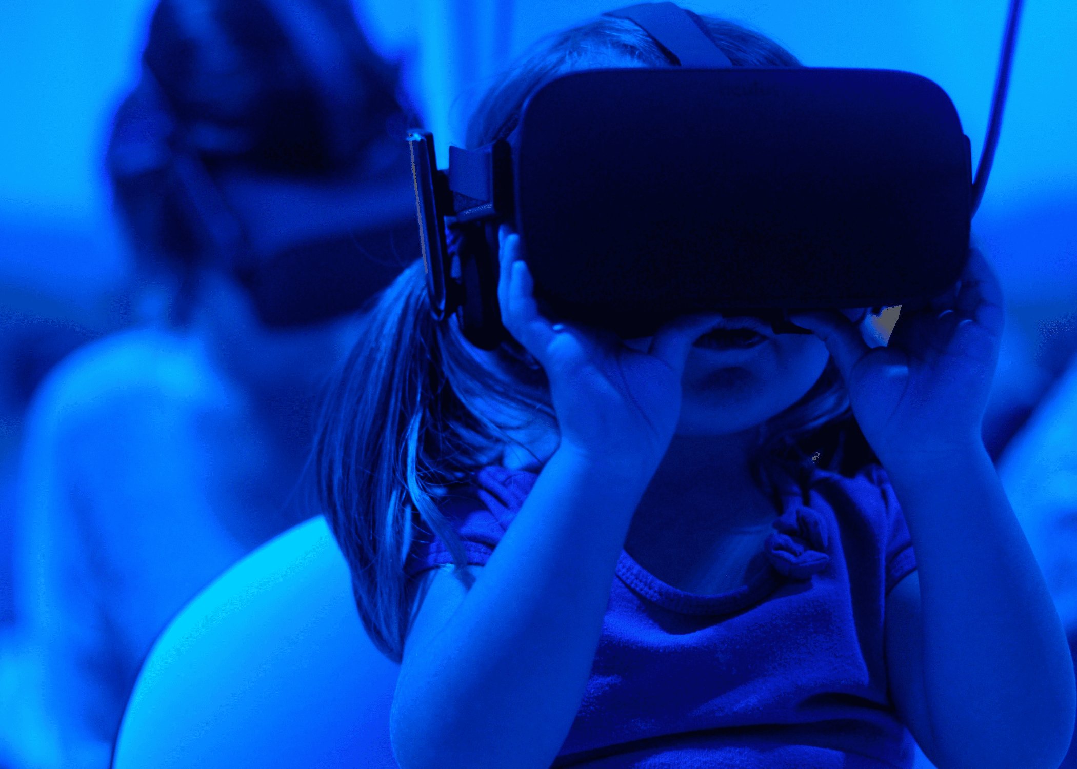 A child wearing a virtual reality headset