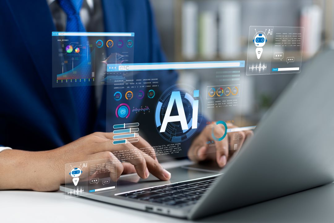 Image of a person on a laptop with AI digitally laid over it.